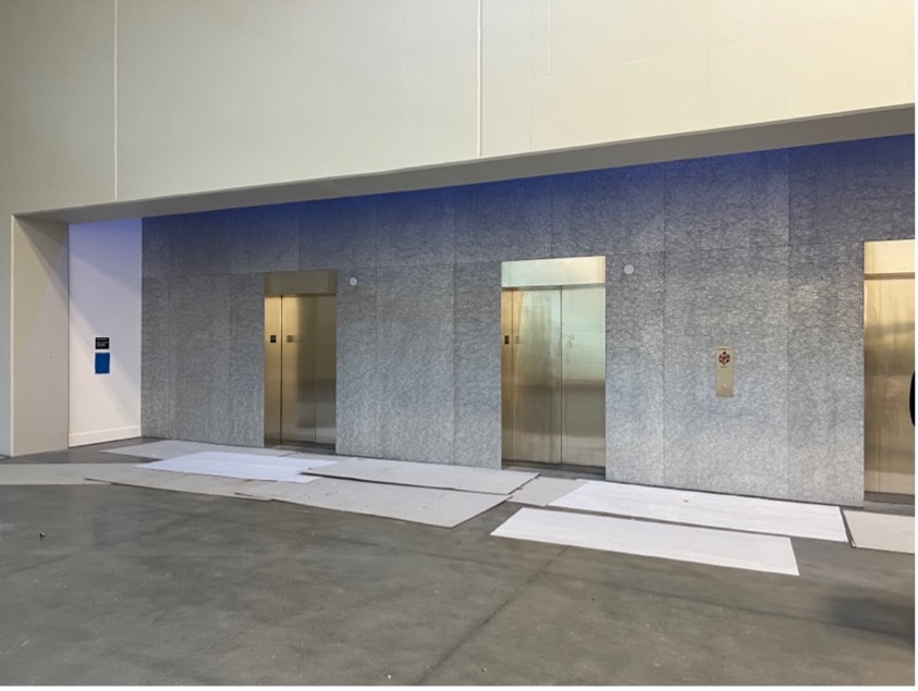 A set of three elevators on the Bookfair level.