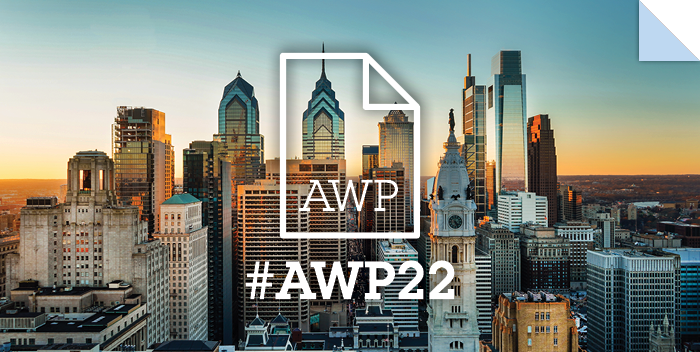 Philadelphia skyline behind a white #AWP22 dogeared page logo